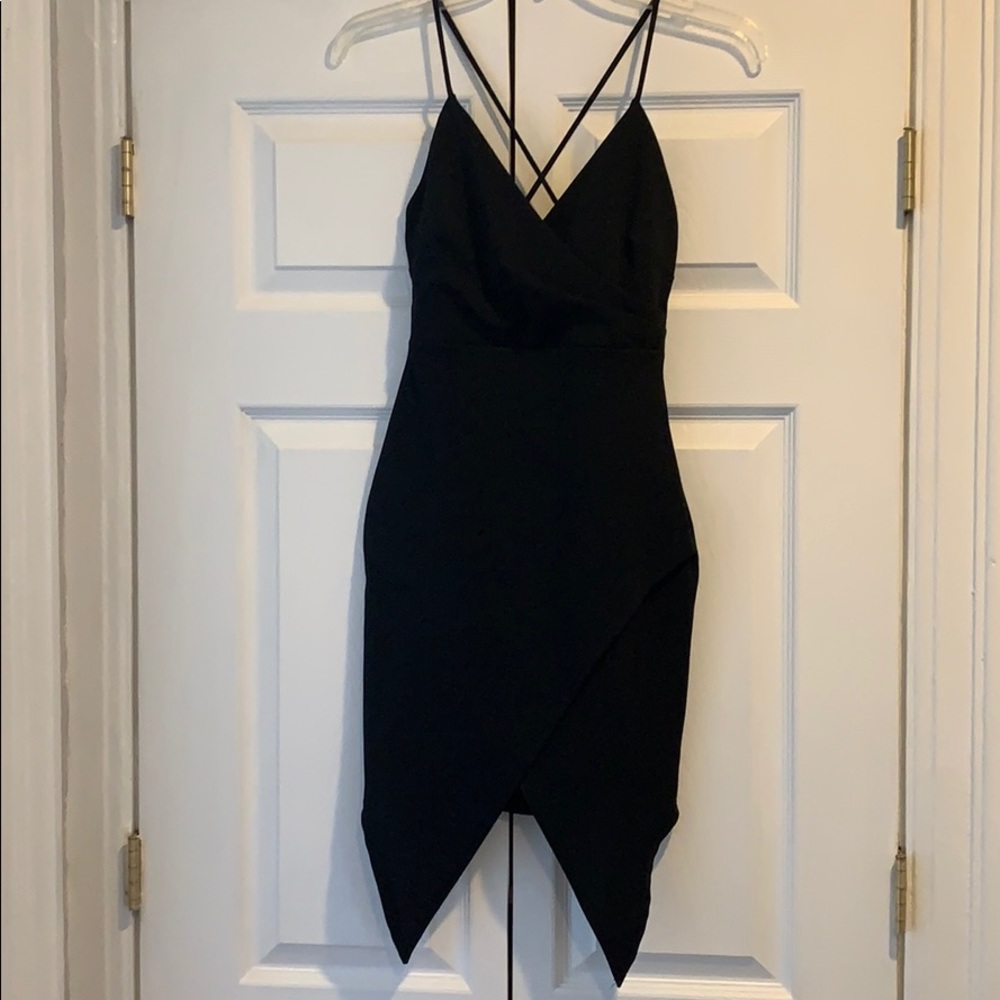 Very cute black dress. Never worn.